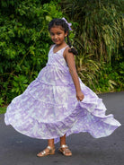Lavender cotton long dress for girls with tiered skirt and ruffled straps, sustainable and casual style.